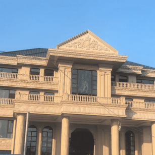 通化黄金麻别墅外墙干挂石材效果示例