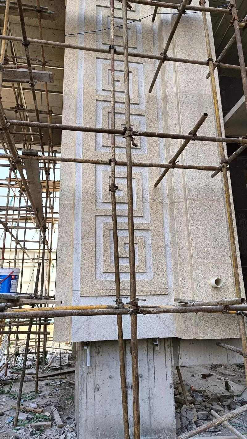 通化 黄金麻花岗岩别墅外墙干挂回纹造型效果